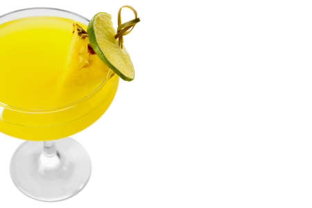 Glass of pineapple daiquiri cocktail on white backgroundの写真素材