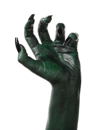 Halloween green witch's or zombie's hand isolated on whiteの写真素材