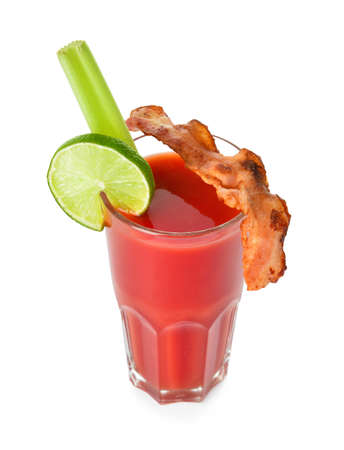 Glass of bloody mary cocktail garnished with bacon on white backgroundの写真素材