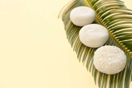 Tasty Japanese mochi on color backgroundの写真素材