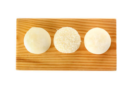 Board with tasty Japanese mochi on white backgroundの写真素材