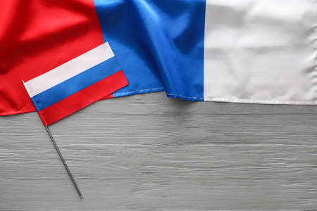 Russian flags on gray wooden background, closeupの写真素材
