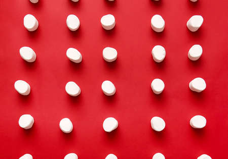 Tasty marshmallows on color backgroundの写真素材