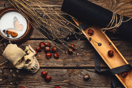 Ingredients for witch's ritual on wooden backgroundの写真素材