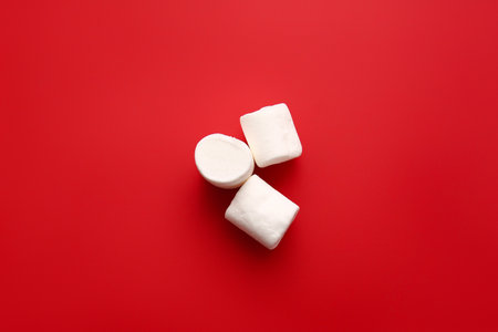 Tasty marshmallows on color backgroundの写真素材