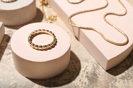 Stylish jewelry on grunge table, closeupの写真素材