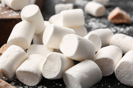 Tasty marshmallows on dark background, closeupの写真素材