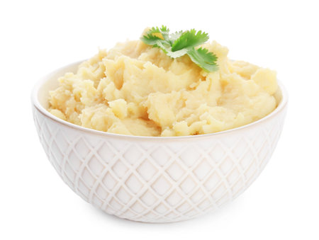 Bowl with tasty mashed potatoes on white backgroundの写真素材