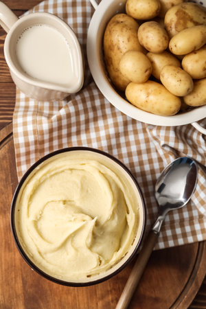 Composition with tasty mashed potatoes on wooden backgroundの写真素材