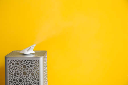 Modern humidifier near color wallの写真素材