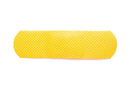 Orange medical plaster on white background