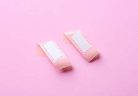 Medical adhesive plasters on color backgroundの写真素材
