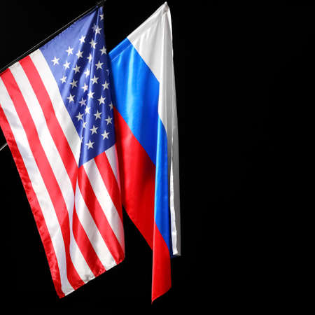 Flags of Russia and USA on dark background, closeupの写真素材