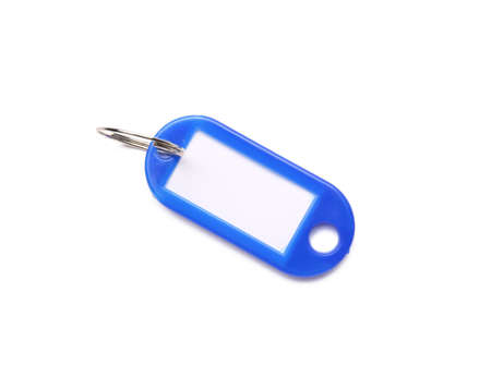 Plastic key tag on white background