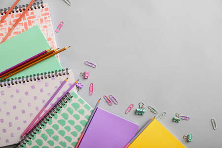 Set of stationery supplies on gray backgroundの写真素材