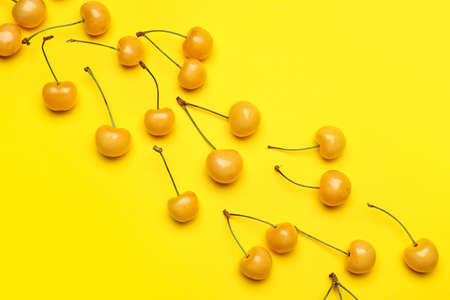 Tasty sweet cherry on color background