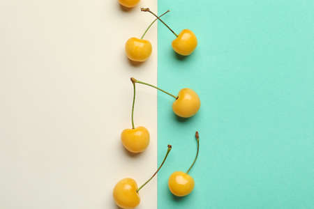 Tasty sweet cherry on color backgroundの写真素材
