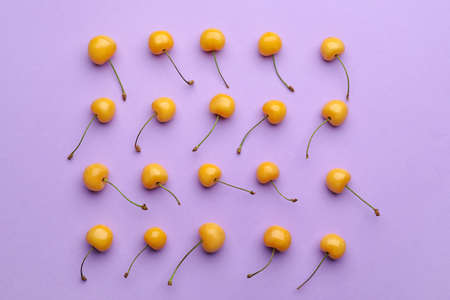 Tasty sweet cherry on color background