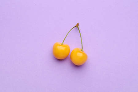 Tasty sweet cherry on color backgroundの写真素材