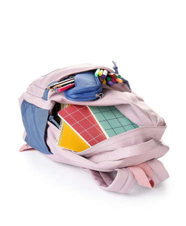 School backpack and stationery on white backgroundの写真素材