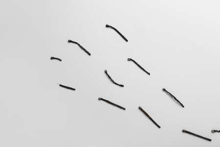 Burnt out matches on light background. concept of work burnout