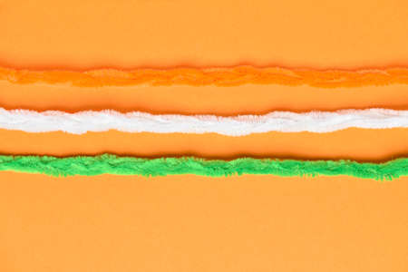 Stripes in colors of Indian flag on orange background