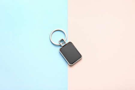 Stylish keychain on color backgroundの写真素材