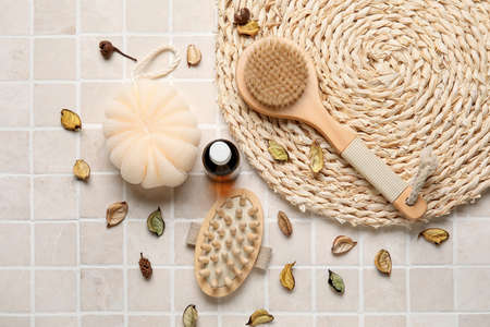 Composition with different body brushes on light tile backgroundの写真素材