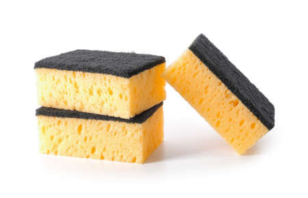 Yellow cleaning sponges on white background