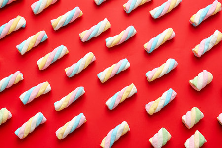 Tasty marshmallows on color backgroundの写真素材