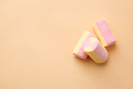 Tasty marshmallows on color backgroundの写真素材