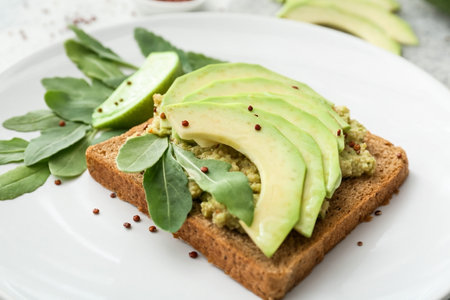 Avocado toast with guacamole on table, closeupの写真素材
