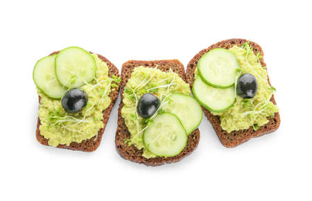 Tasty sandwiches with guacamole on white background