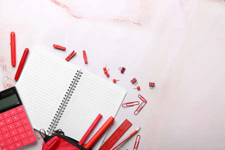 Blank notebook and stationery on light grunge backgroundの写真素材