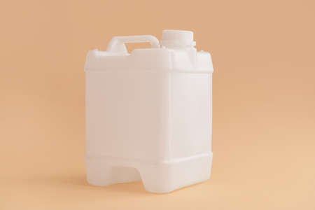 Plastic jerry can on color backgroundの写真素材