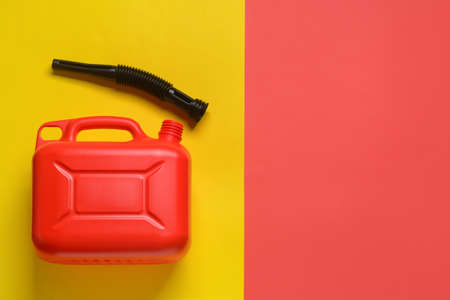 Plastic jerry can on color backgroundの写真素材
