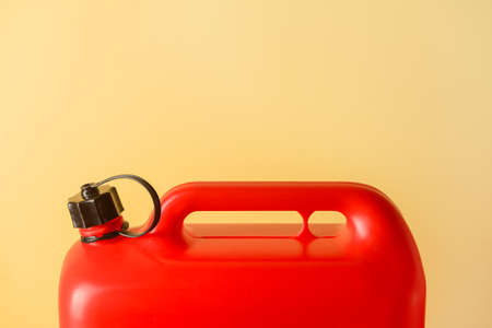 Plastic jerry can on color backgroundの写真素材
