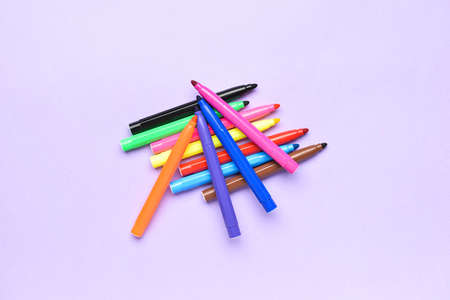 Colorful markers on color backgroundの写真素材