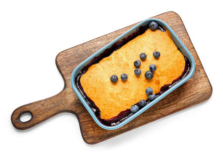 Baking dish with blueberry cobbler on white backgroundの写真素材
