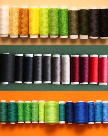 Many different threads on colorful background