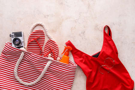 Set of beach accessories on light backgroundの写真素材