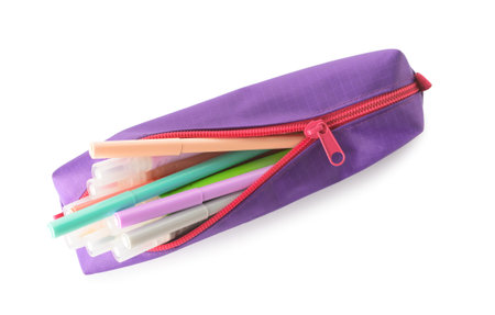 Pencil case with felt tip pens on white background