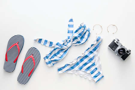 Set of beach accessories on white backgroundの写真素材