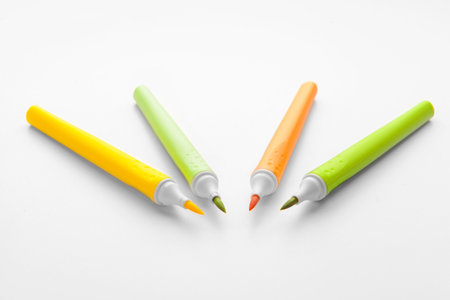 Felt tip pens on white background
