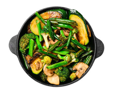 Frying pan with different vegetables on white backgroundの写真素材