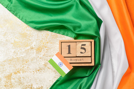 Indian flags and calendar with date 15 August on light background. independence day celebration