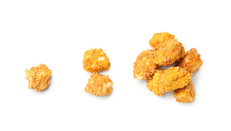 Crunchy popcorn chicken on white backgroundの写真素材