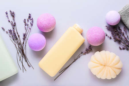 Composition with bath supplies, bombs and lavender flowers on light backgroundの写真素材