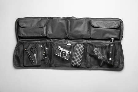 Travel organizer with different things on gray backgroundの写真素材