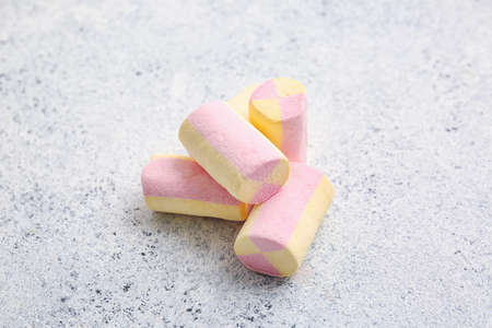 Tasty pastille marshmallows on light backgroundの写真素材